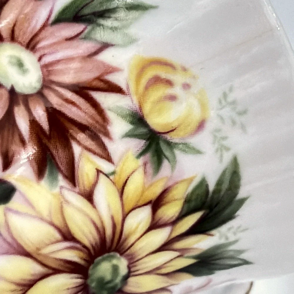 Vintage Queen's Rosina Wild Flowers fine bone china Tea cup with matching saucer